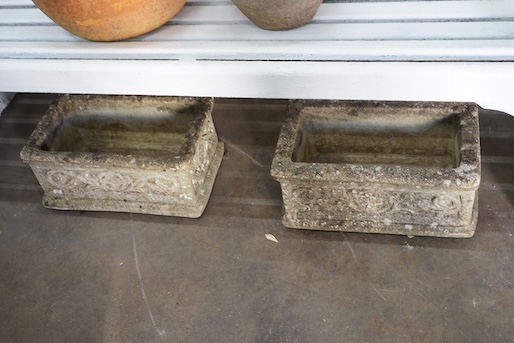 A pair of rectangular reconstituted stone garden planters, width 43cm, depth 26cm, height 20cm